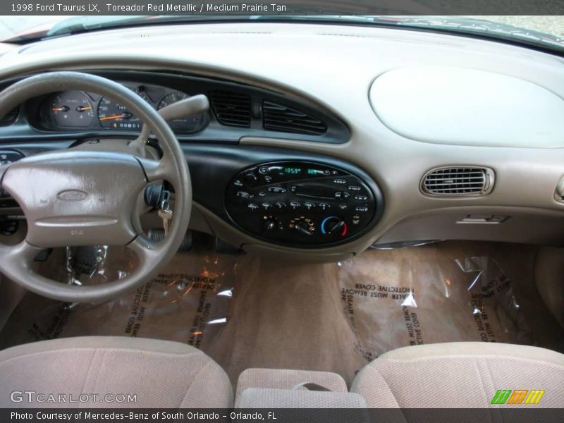 Toreador Red Metallic / Medium Prairie Tan 1998 Ford Taurus LX