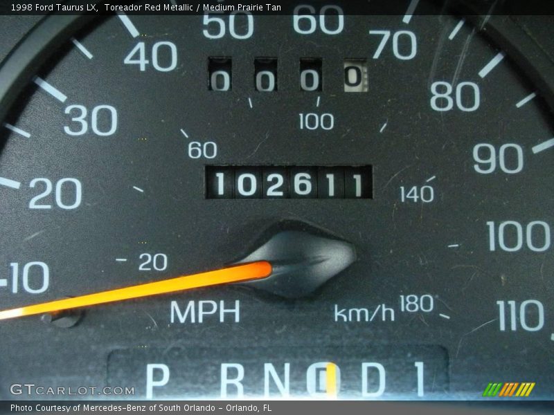 Toreador Red Metallic / Medium Prairie Tan 1998 Ford Taurus LX