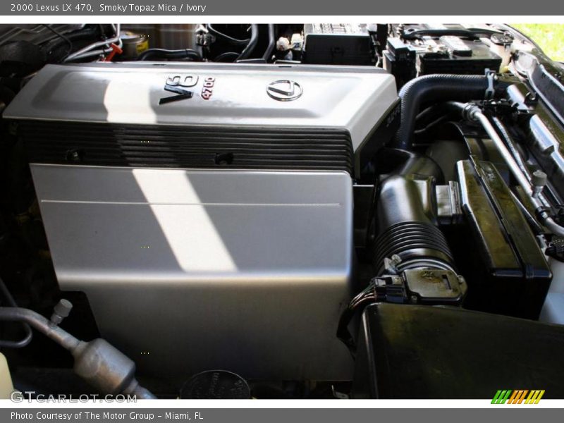 Smoky Topaz Mica / Ivory 2000 Lexus LX 470