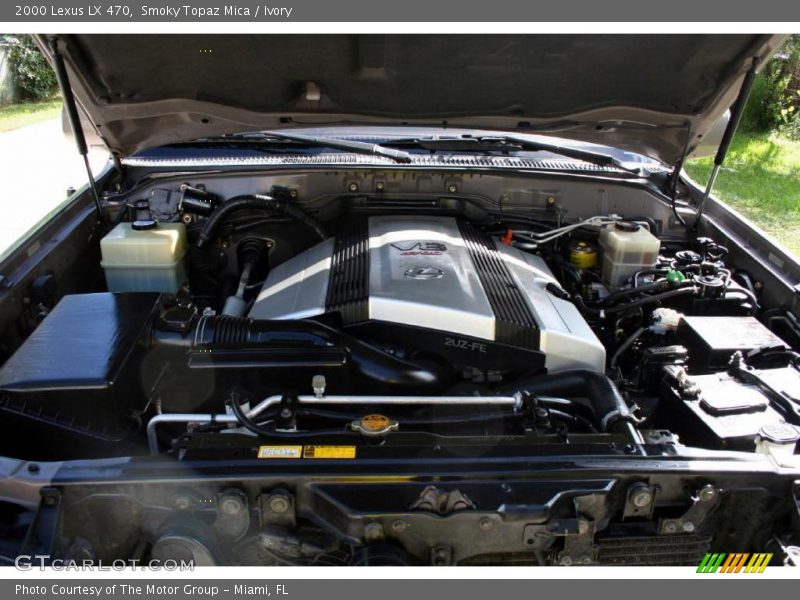 Smoky Topaz Mica / Ivory 2000 Lexus LX 470