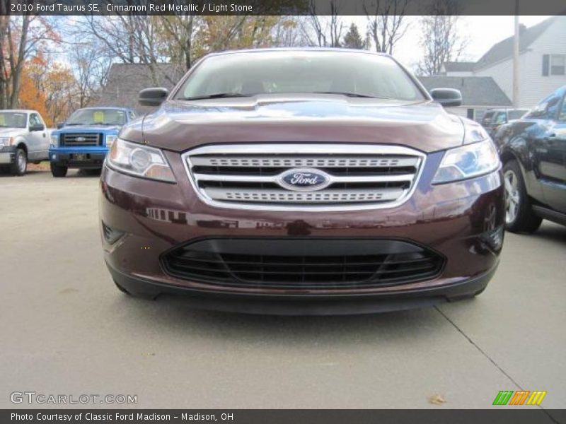 Cinnamon Red Metallic / Light Stone 2010 Ford Taurus SE