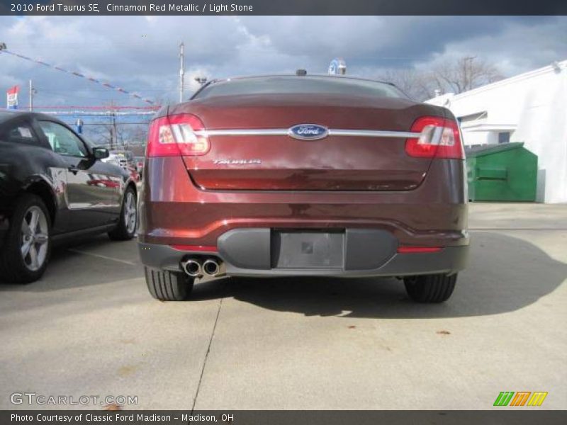 Cinnamon Red Metallic / Light Stone 2010 Ford Taurus SE