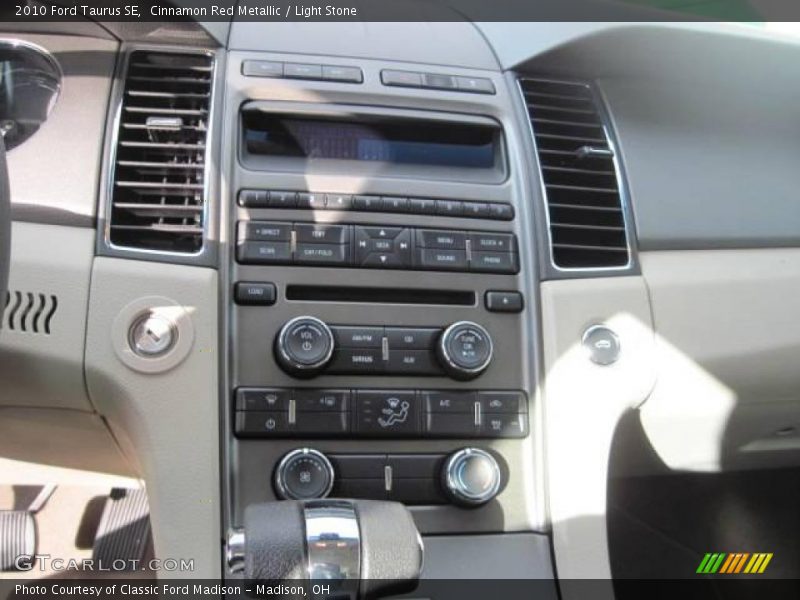 Cinnamon Red Metallic / Light Stone 2010 Ford Taurus SE