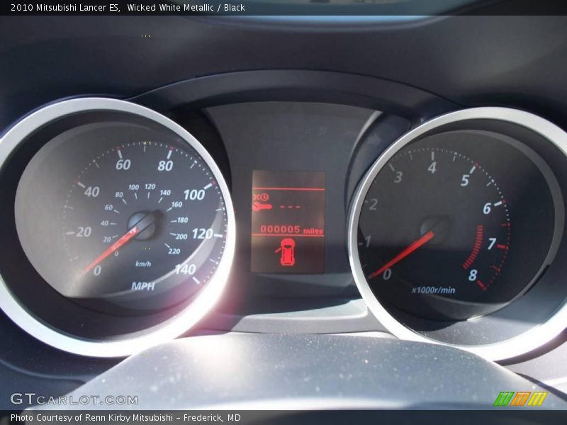 Wicked White Metallic / Black 2010 Mitsubishi Lancer ES