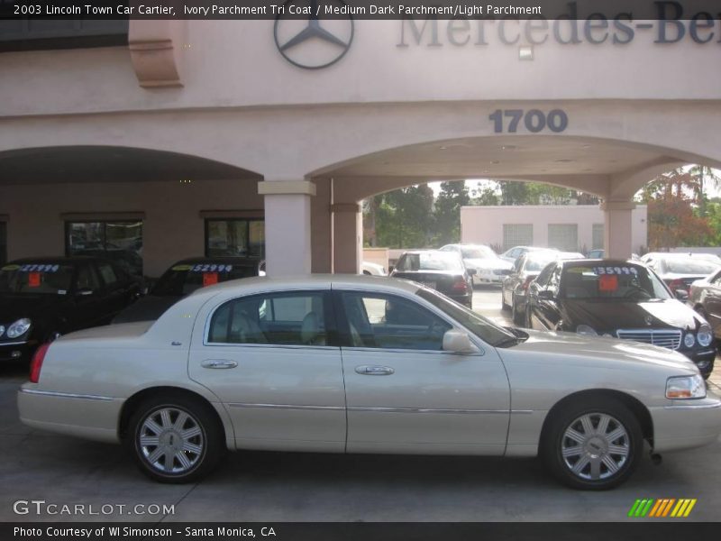 Ivory Parchment Tri Coat / Medium Dark Parchment/Light Parchment 2003 Lincoln Town Car Cartier