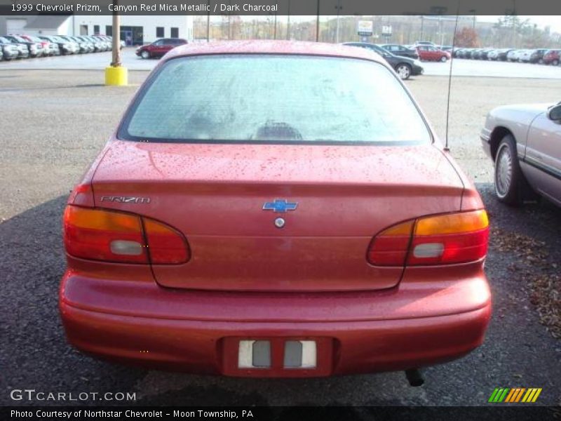 Canyon Red Mica Metallic / Dark Charcoal 1999 Chevrolet Prizm
