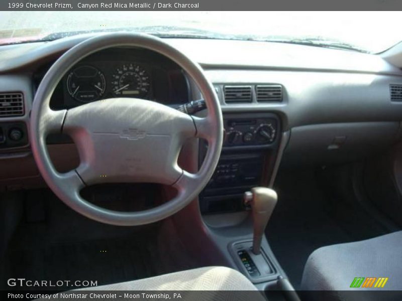 Canyon Red Mica Metallic / Dark Charcoal 1999 Chevrolet Prizm