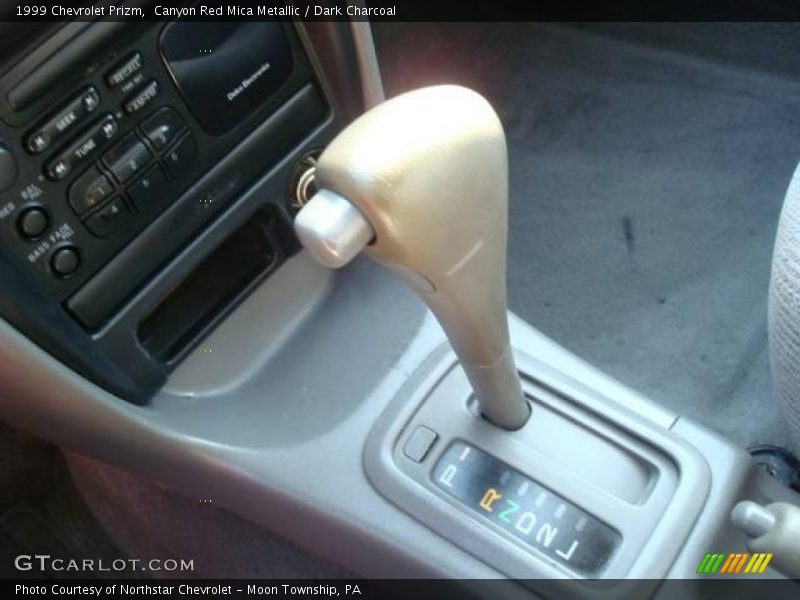 Canyon Red Mica Metallic / Dark Charcoal 1999 Chevrolet Prizm