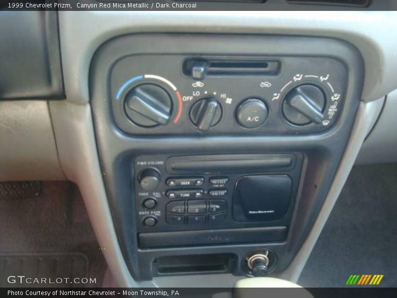 Canyon Red Mica Metallic / Dark Charcoal 1999 Chevrolet Prizm