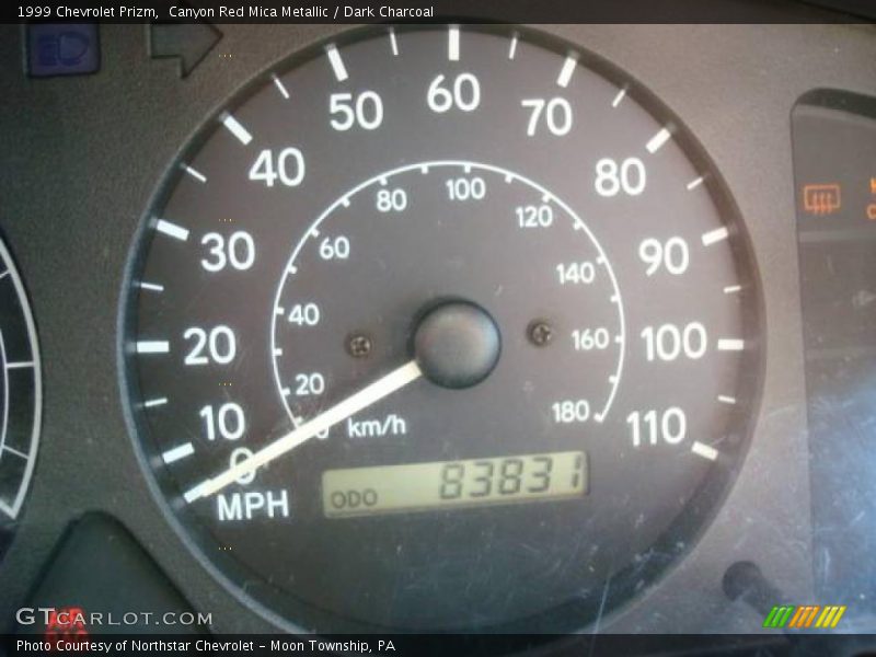 Canyon Red Mica Metallic / Dark Charcoal 1999 Chevrolet Prizm