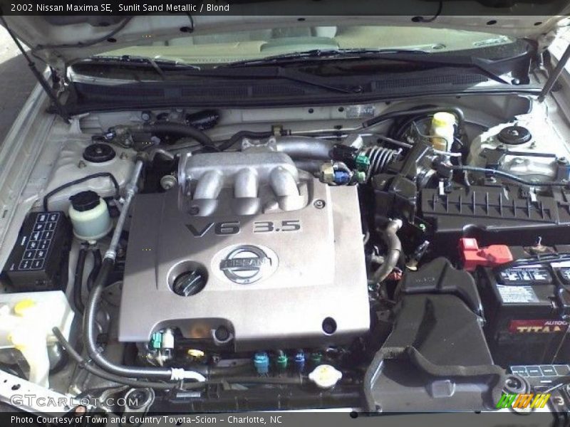 Sunlit Sand Metallic / Blond 2002 Nissan Maxima SE