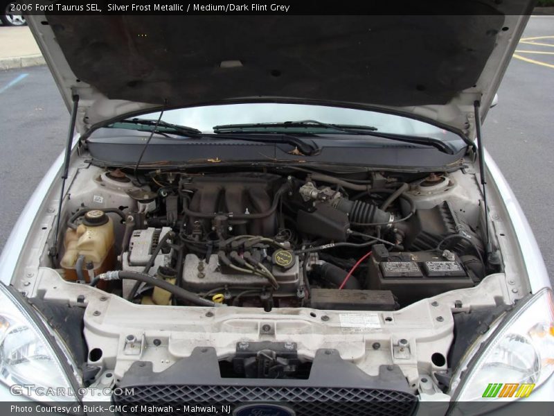 Silver Frost Metallic / Medium/Dark Flint Grey 2006 Ford Taurus SEL