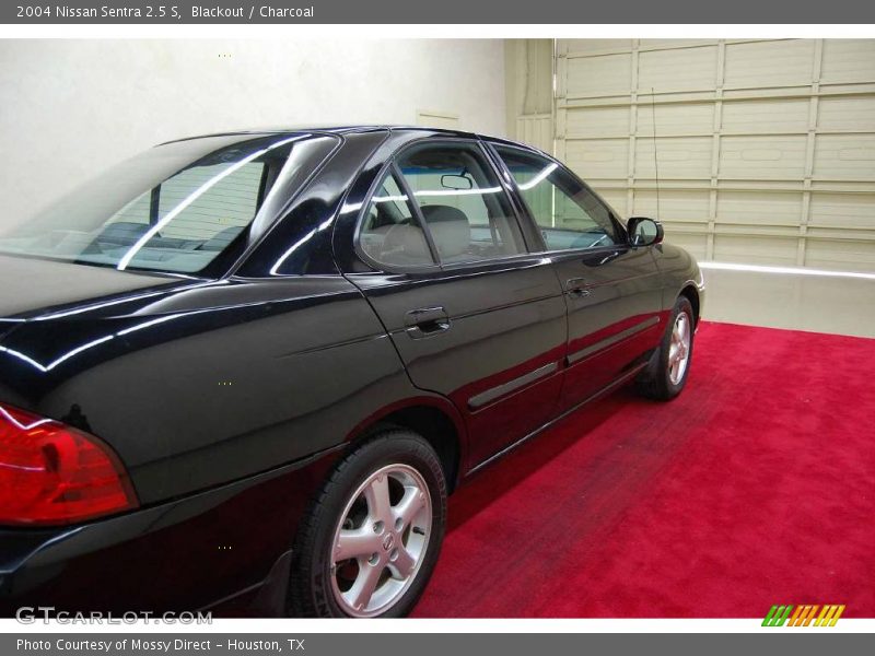 Blackout / Charcoal 2004 Nissan Sentra 2.5 S