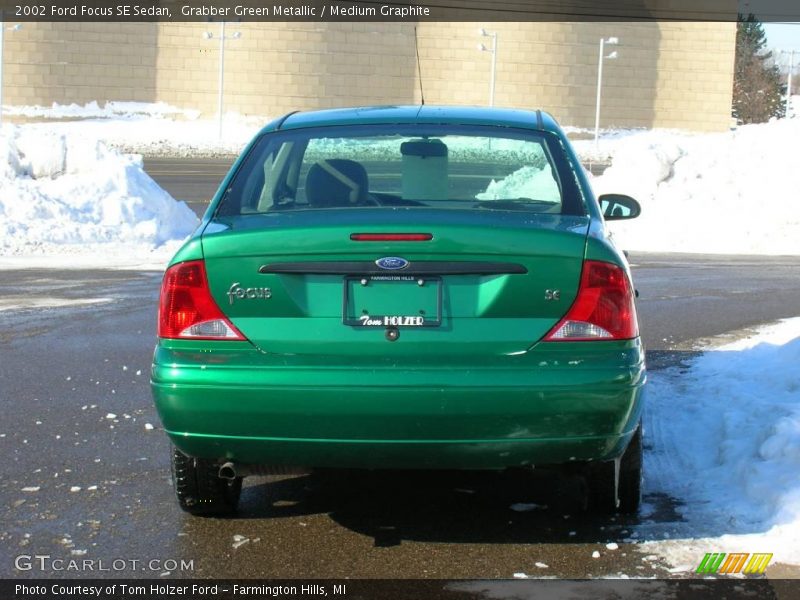 Grabber Green Metallic / Medium Graphite 2002 Ford Focus SE Sedan