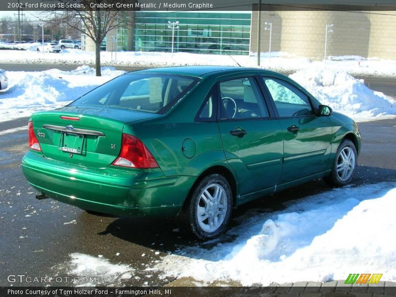 Grabber Green Metallic / Medium Graphite 2002 Ford Focus SE Sedan