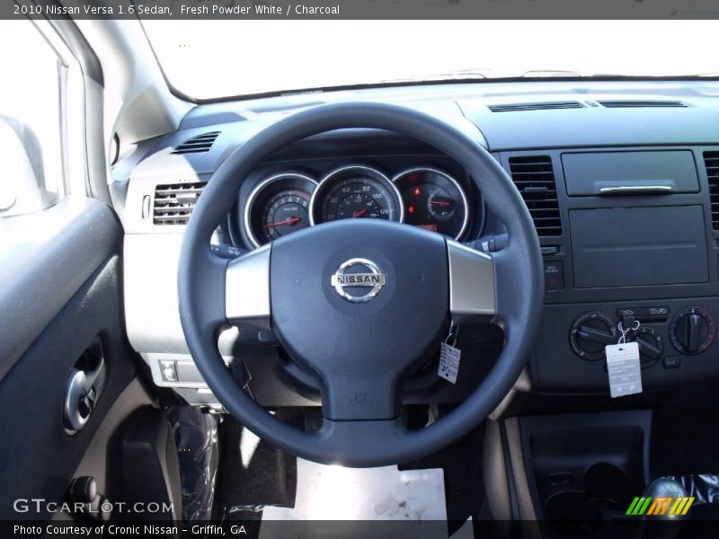 Fresh Powder White / Charcoal 2010 Nissan Versa 1.6 Sedan