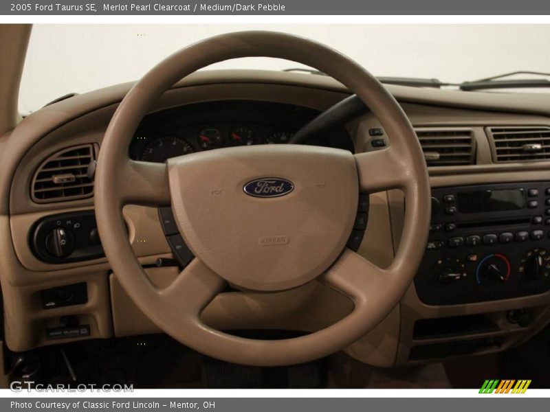 Merlot Pearl Clearcoat / Medium/Dark Pebble 2005 Ford Taurus SE