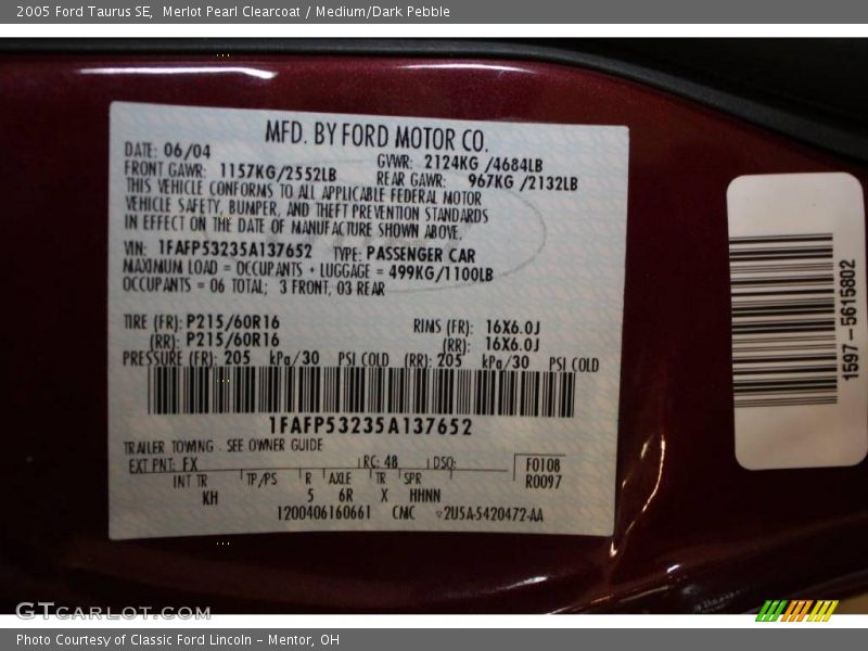 Merlot Pearl Clearcoat / Medium/Dark Pebble 2005 Ford Taurus SE