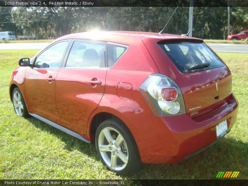 Red Hot Metallic / Ebony 2009 Pontiac Vibe 2.4