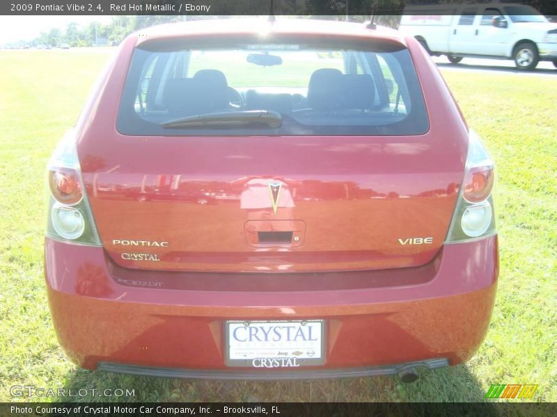 Red Hot Metallic / Ebony 2009 Pontiac Vibe 2.4