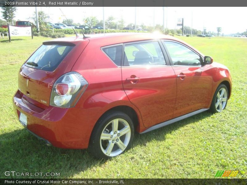 Red Hot Metallic / Ebony 2009 Pontiac Vibe 2.4