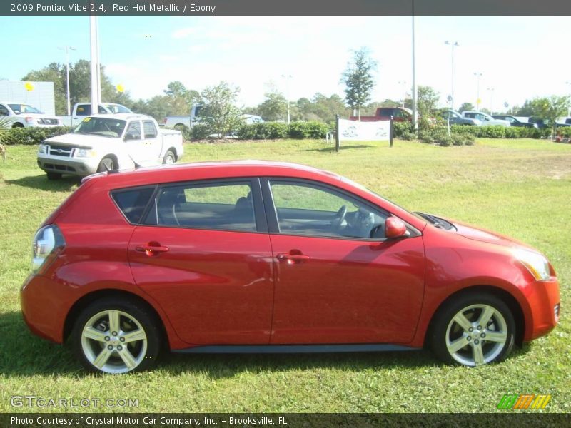 Red Hot Metallic / Ebony 2009 Pontiac Vibe 2.4