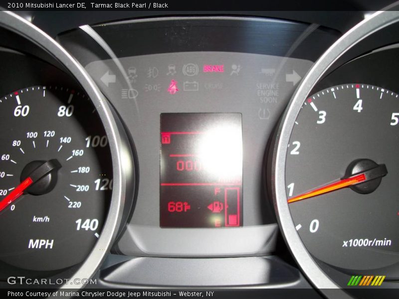 Tarmac Black Pearl / Black 2010 Mitsubishi Lancer DE