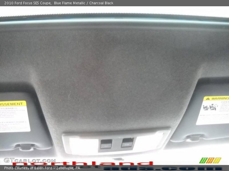 Blue Flame Metallic / Charcoal Black 2010 Ford Focus SES Coupe