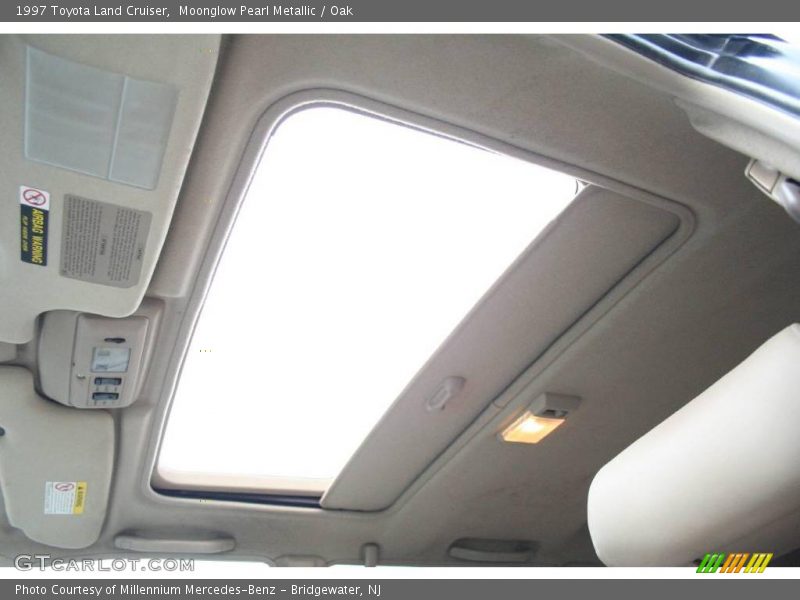 Moonglow Pearl Metallic / Oak 1997 Toyota Land Cruiser