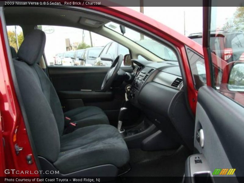 Red Brick / Charcoal 2009 Nissan Versa 1.8 S Sedan