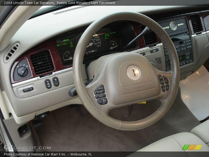 Pueblo Gold Metallic / Light Parchment 2004 Lincoln Town Car Signature