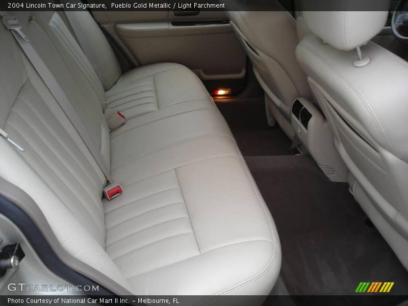 Pueblo Gold Metallic / Light Parchment 2004 Lincoln Town Car Signature