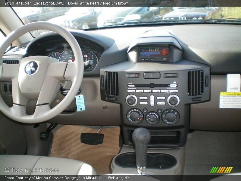 Dover White Pearl / Medium Brown 2010 Mitsubishi Endeavor SE AWD