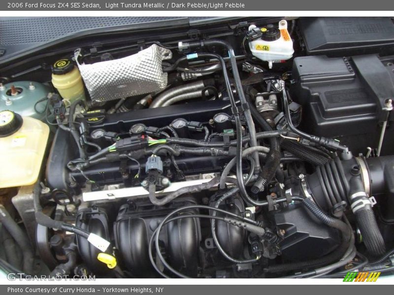 Light Tundra Metallic / Dark Pebble/Light Pebble 2006 Ford Focus ZX4 SES Sedan