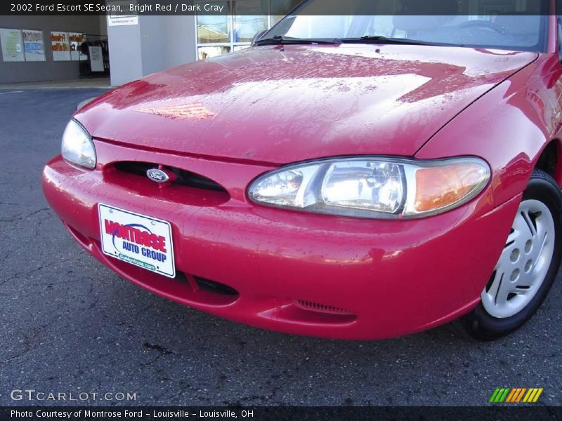 Bright Red / Dark Gray 2002 Ford Escort SE Sedan