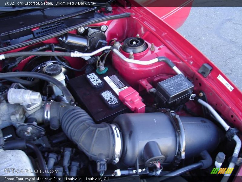 Bright Red / Dark Gray 2002 Ford Escort SE Sedan