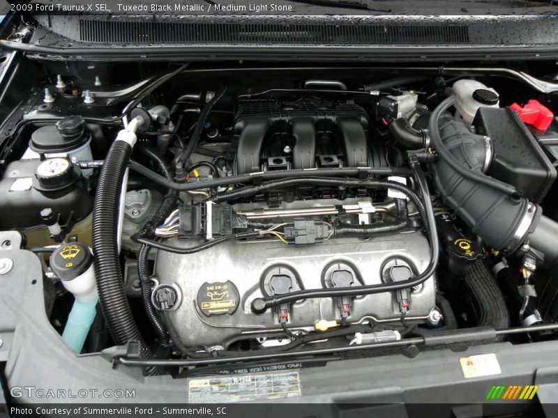 Tuxedo Black Metallic / Medium Light Stone 2009 Ford Taurus X SEL
