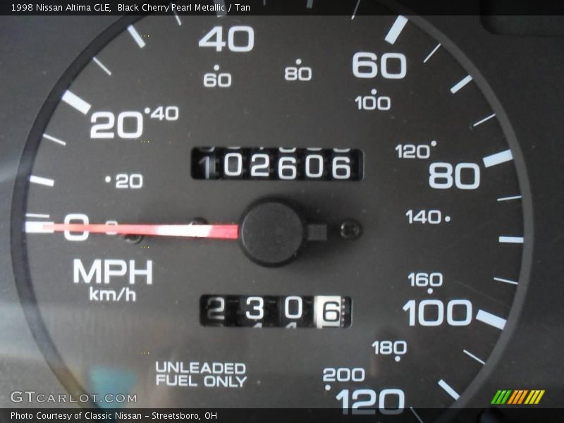 Black Cherry Pearl Metallic / Tan 1998 Nissan Altima GLE