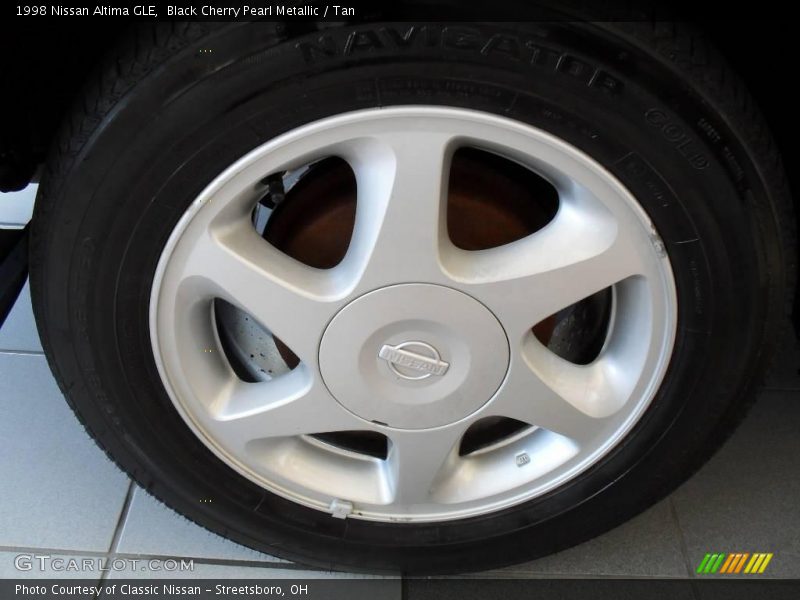 Black Cherry Pearl Metallic / Tan 1998 Nissan Altima GLE