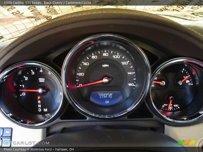 Black Cherry / Cashmere/Cocoa 2009 Cadillac CTS Sedan