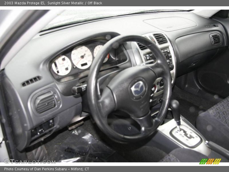 Sunlight Silver Metallic / Off Black 2003 Mazda Protege ES