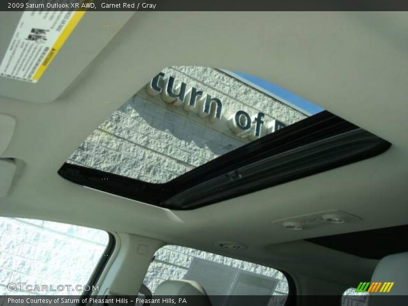 Garnet Red / Gray 2009 Saturn Outlook XR AWD