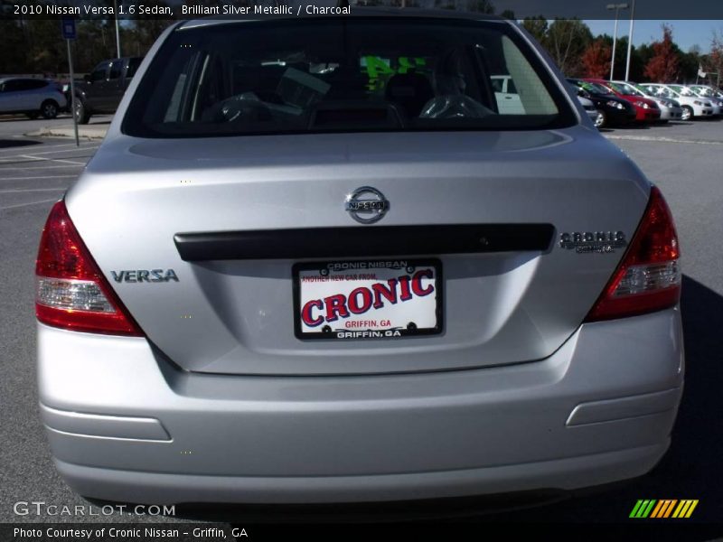 Brilliant Silver Metallic / Charcoal 2010 Nissan Versa 1.6 Sedan