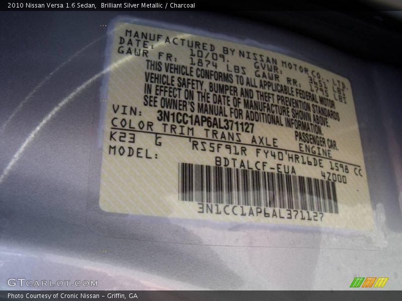 Brilliant Silver Metallic / Charcoal 2010 Nissan Versa 1.6 Sedan