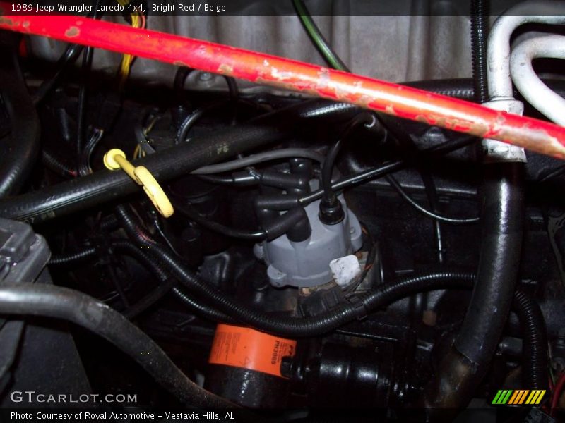 Bright Red / Beige 1989 Jeep Wrangler Laredo 4x4