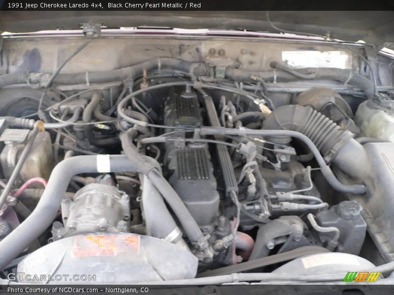 Black Cherry Pearl Metallic / Red 1991 Jeep Cherokee Laredo 4x4