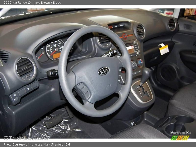 Java Brown / Black 2009 Kia Rondo LX