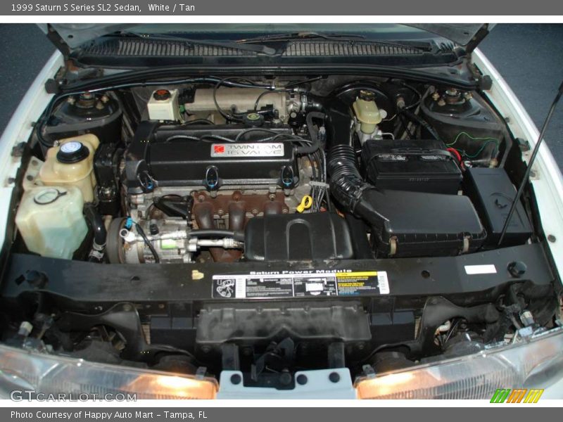 White / Tan 1999 Saturn S Series SL2 Sedan