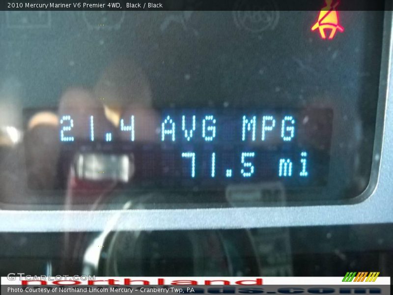 Black / Black 2010 Mercury Mariner V6 Premier 4WD