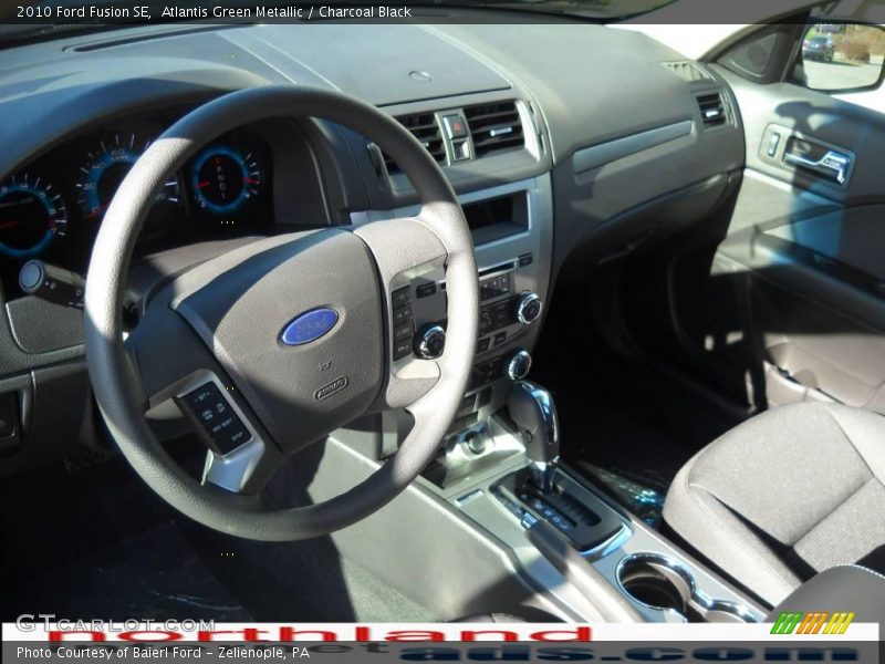 Atlantis Green Metallic / Charcoal Black 2010 Ford Fusion SE